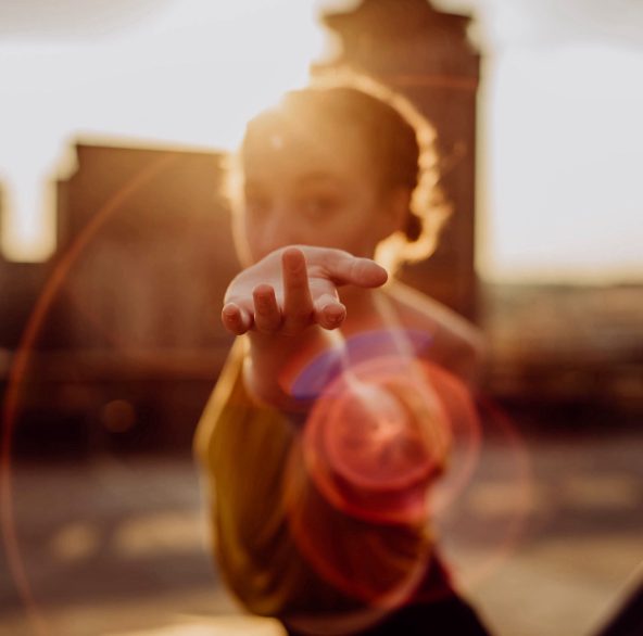 Woman in a moment of joyful, expressive movement